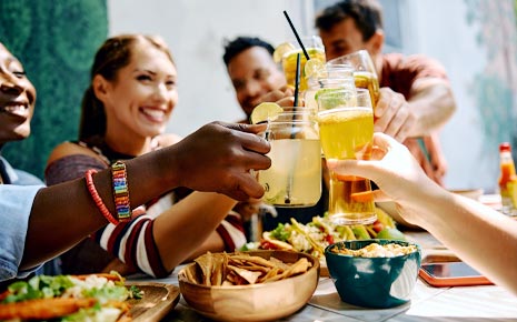 Group of people enjoying dinner